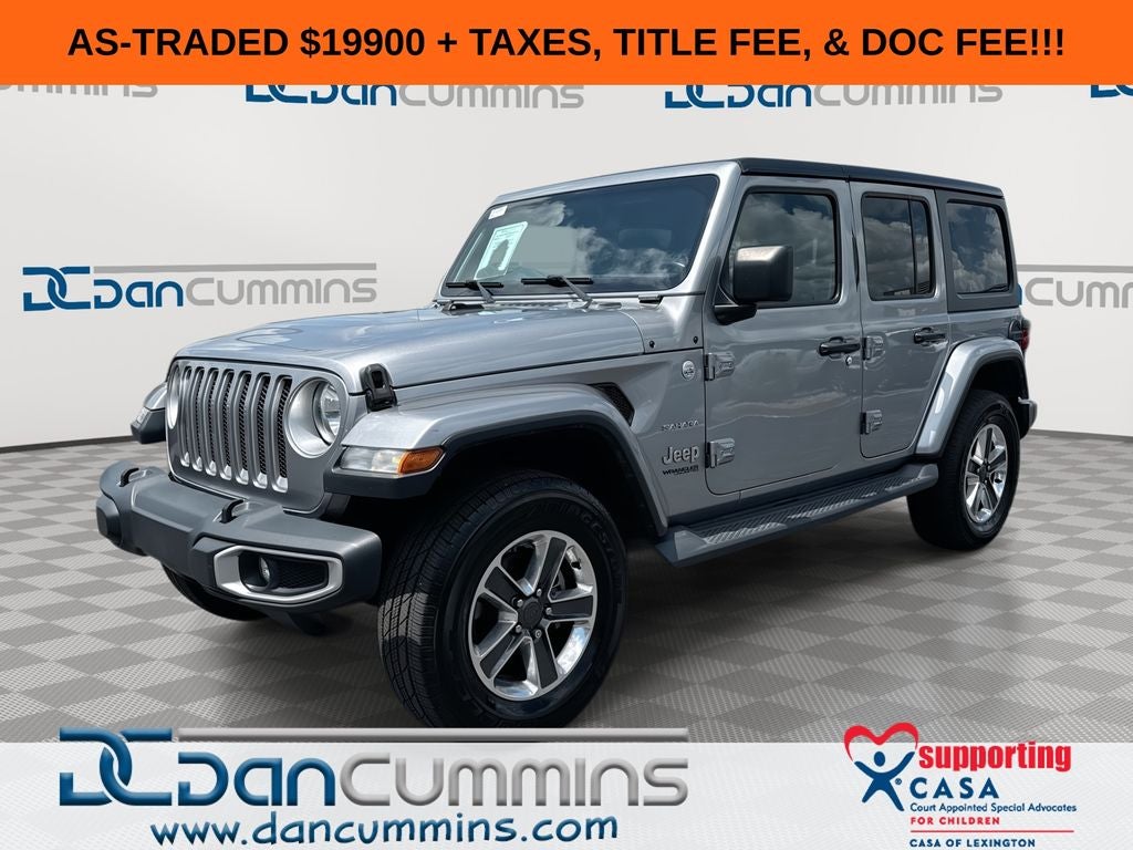 2019 Jeep Wrangler Unlimited Sahara in Billet Silver Metallic Clearcoat — front three-quarter view