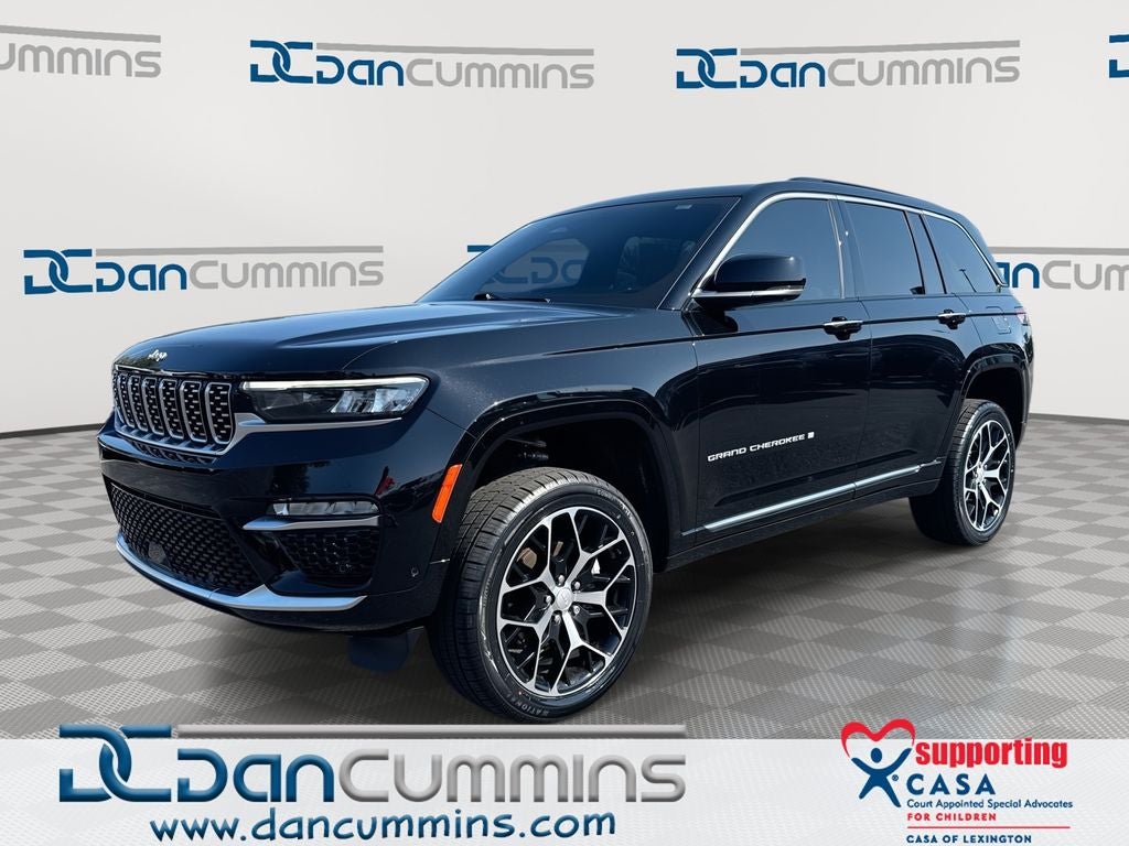 2024 Jeep Grand Cherokee Summit Reserve in Diamond Black Crystal Pearlcoat — front three-quarter view