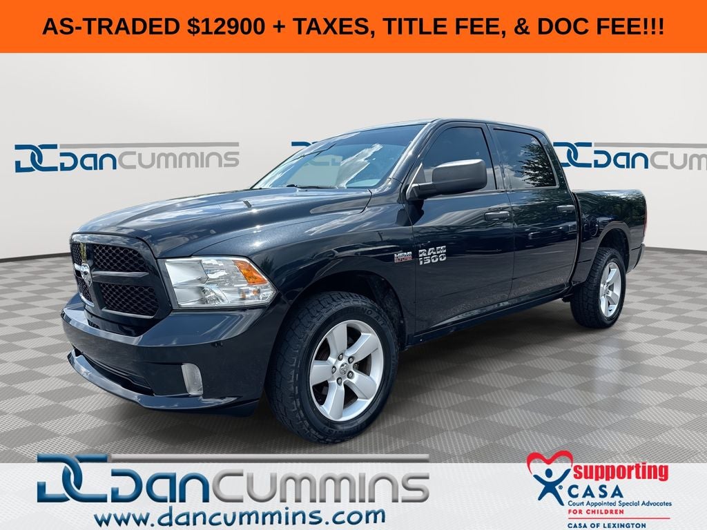 2016 RAM 1500 Express in Brilliant Black Crystal Pearlcoat — front three-quarter view