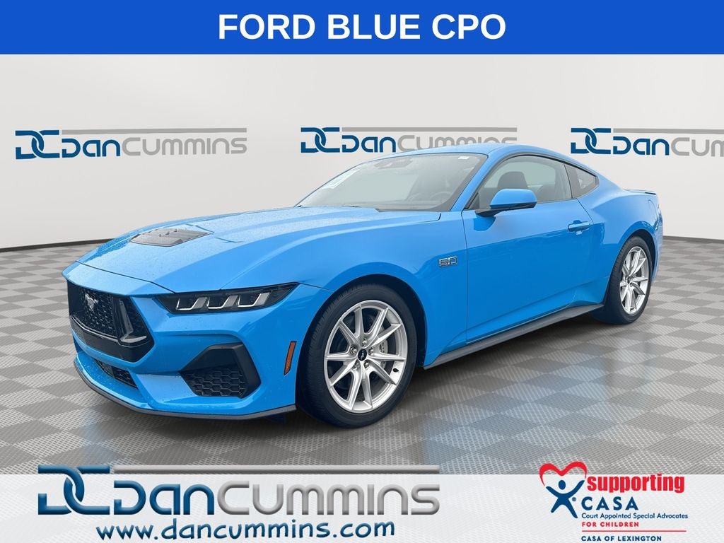2025 Ford Mustang GT Premium in Grabber Blue Metallic — front three-quarter view