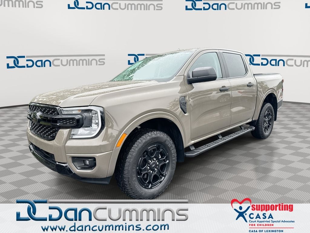 2025 Ford Ranger XLT in Marsh Gray — front three-quarter view