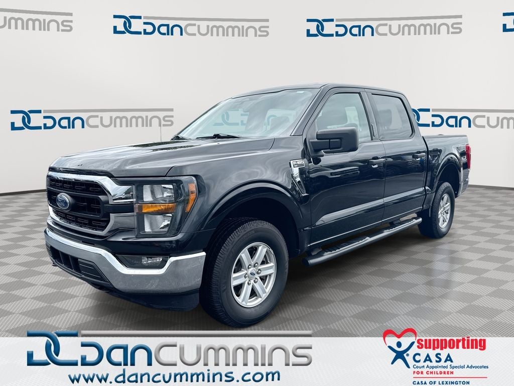 2023 Ford F-150 XLT in Black Metallic — front three-quarter view