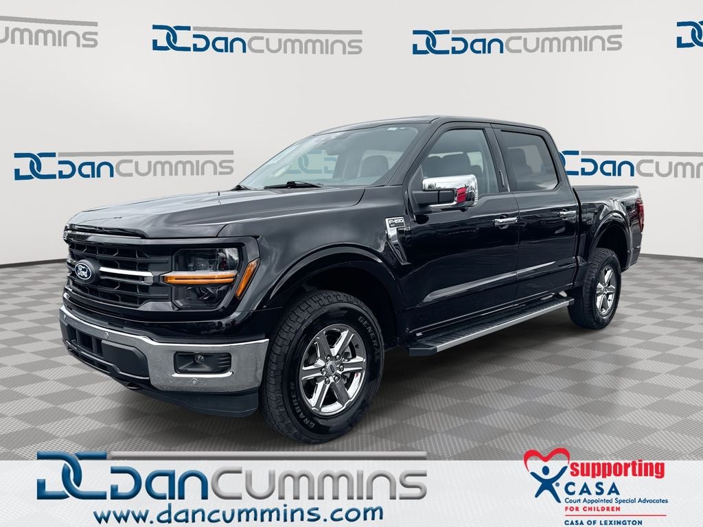 2024 Ford F-150 XLT in Agate Black Metallic — front three-quarter view
