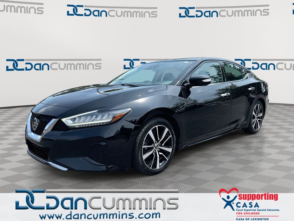 2021 Nissan Maxima SV in Super Black — front three-quarter view