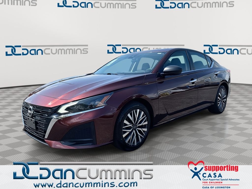2024 Nissan Altima 2.5 SV in Garnet Pearl Metallic — front three-quarter view