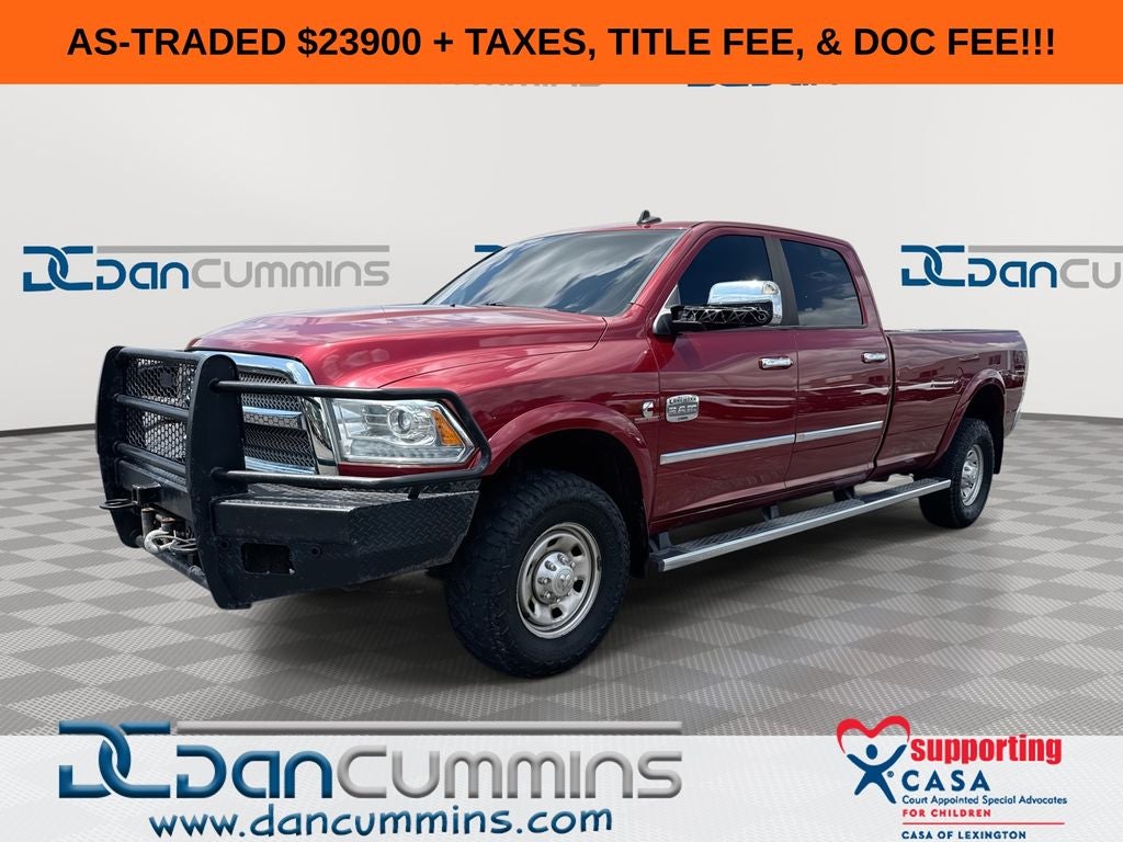 2014 RAM 2500 Laramie Longhorn in Deep Cherry Red Crystal Pearlcoat — front three-quarter view