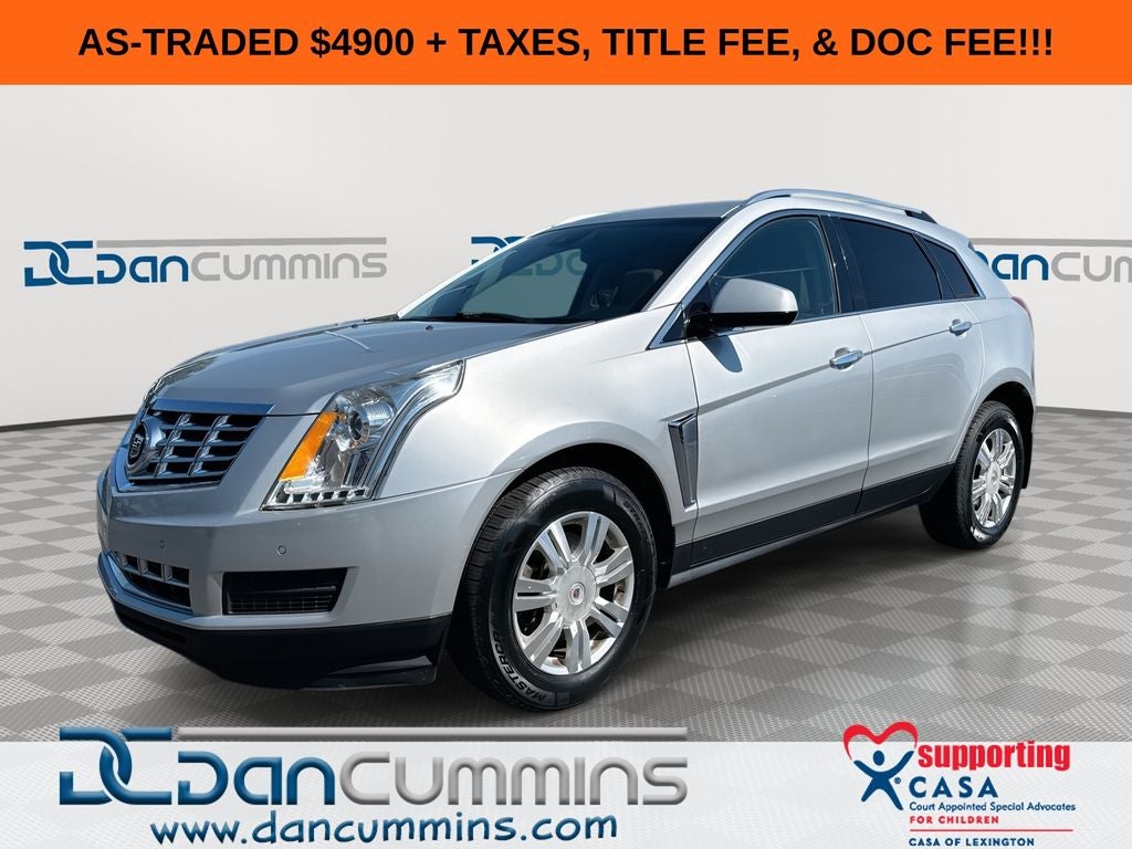 2013 Cadillac SRX Luxury in Radiant Silver Metallic — front three-quarter view