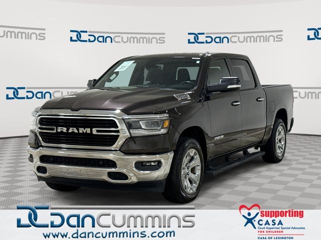 2019 RAM 1500 Big Horn/Lone Star in Rugged Brown Pearlcoat — front three-quarter view