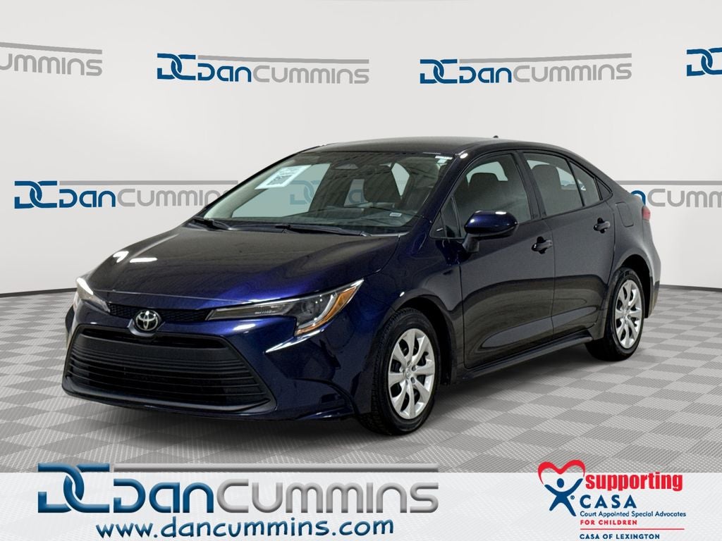 2024 Toyota Corolla LE in Blueprint — front three-quarter view