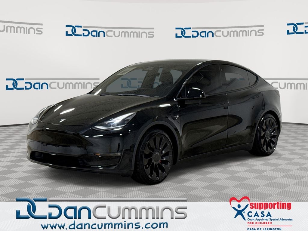 2022 Tesla Model Y Performance in Black — front three-quarter view