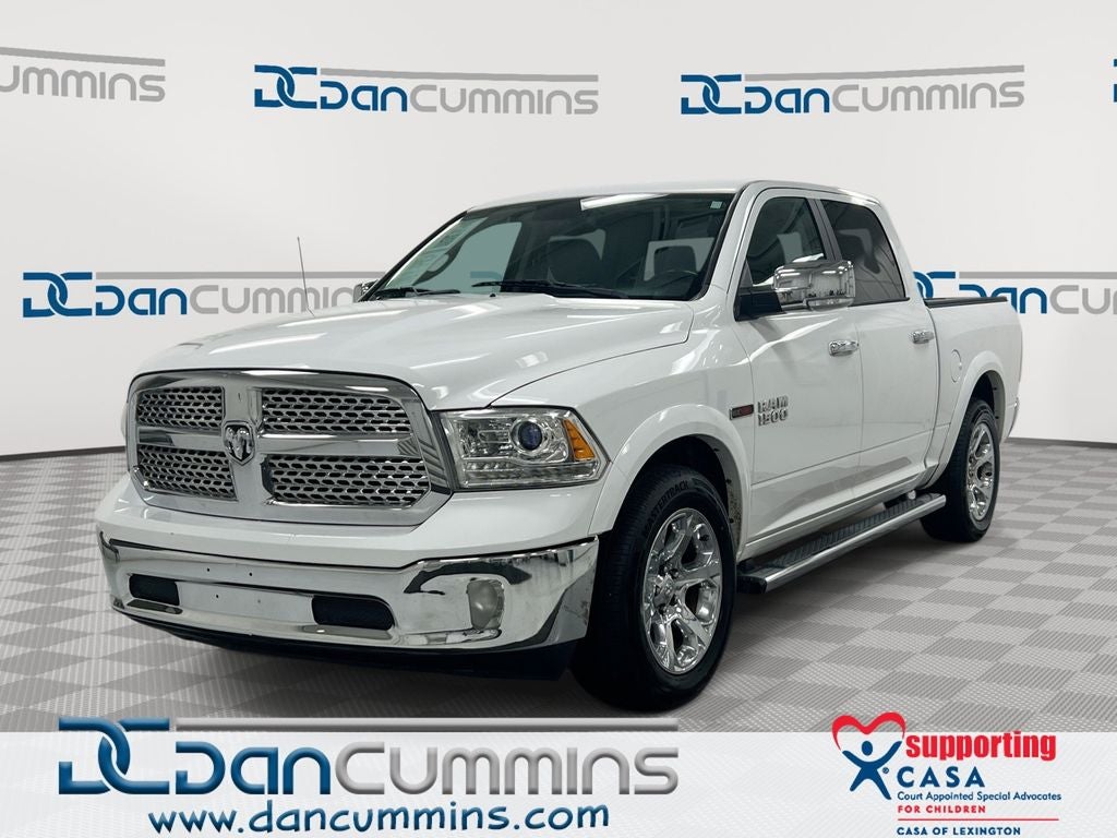 2018 RAM 1500 Laramie in Bright White Clearcoat — front three-quarter view