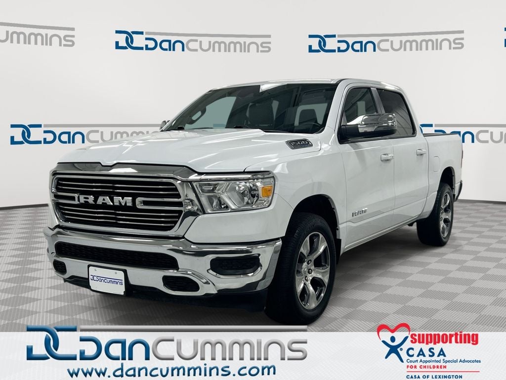 2024 RAM 1500 Laramie in Bright White Clearcoat — front three-quarter view