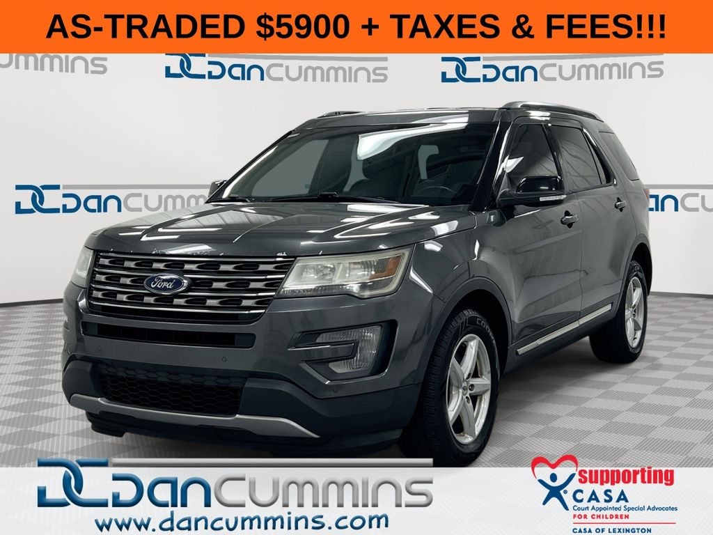 2016 Ford Explorer XLT in Magnetic — front three-quarter view
