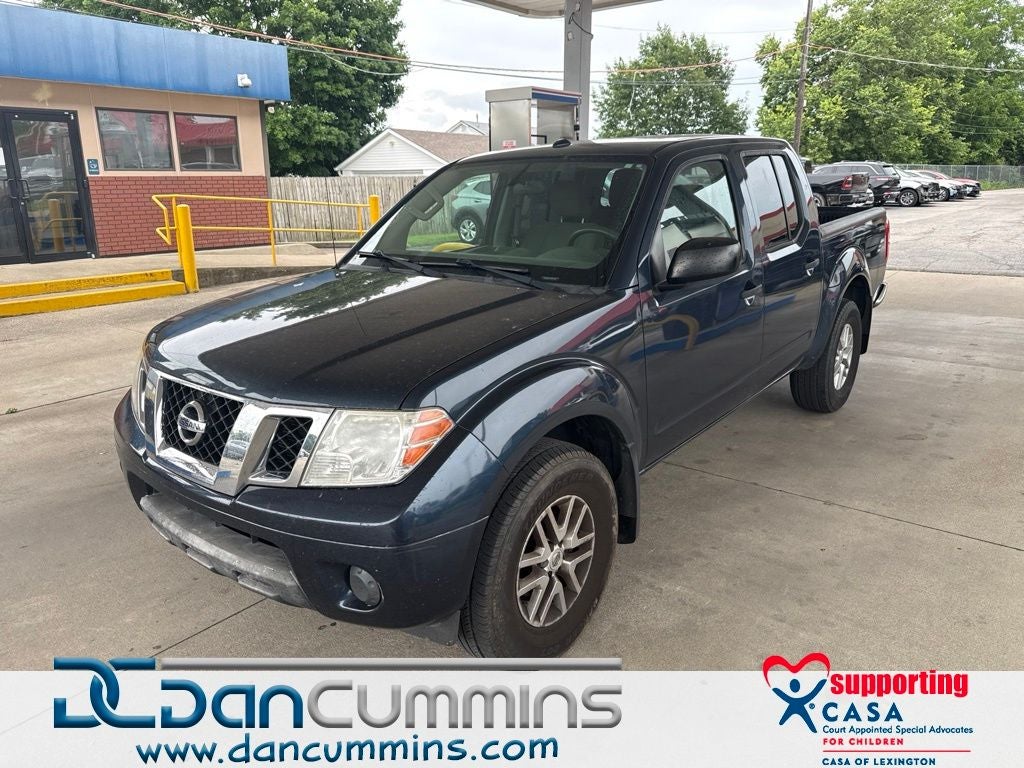 2017 Nissan Frontier SV in Arctic Blue Metallic — front three-quarter view