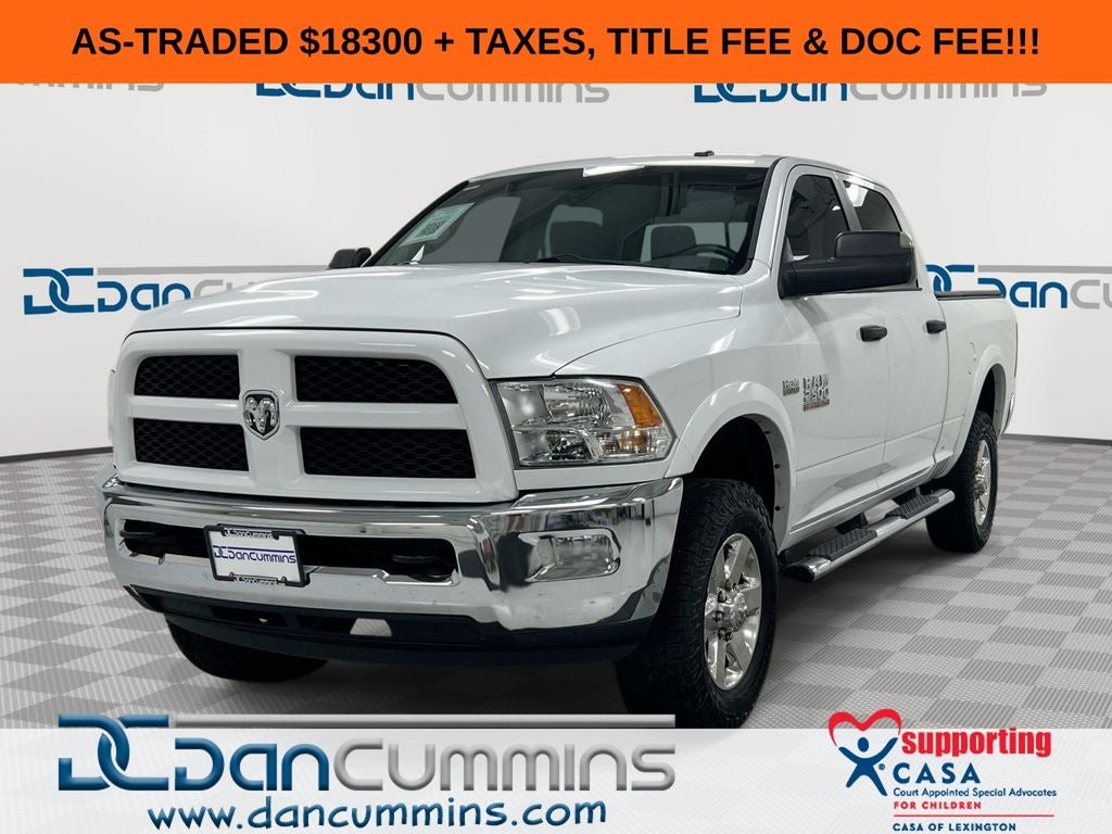 2015 RAM 2500 Outdoorsman in Bright White Clearcoat — front three-quarter view