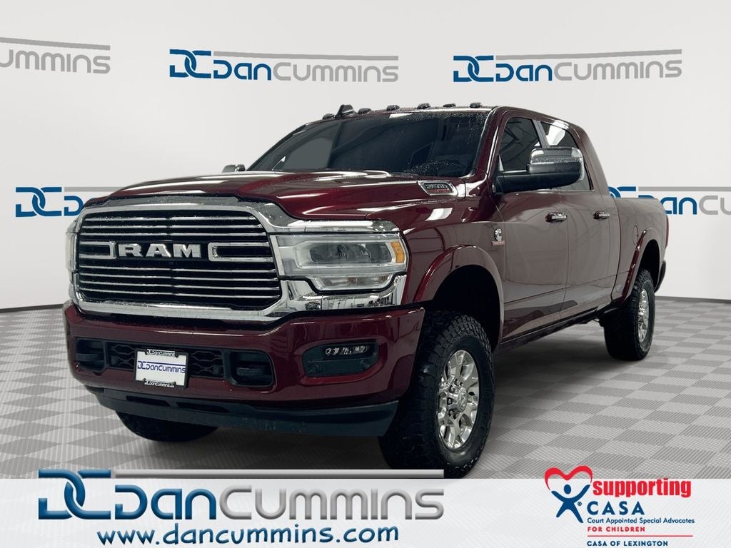 2022 RAM 2500 Laramie in Delmonico Red Pearlcoat — front three-quarter view