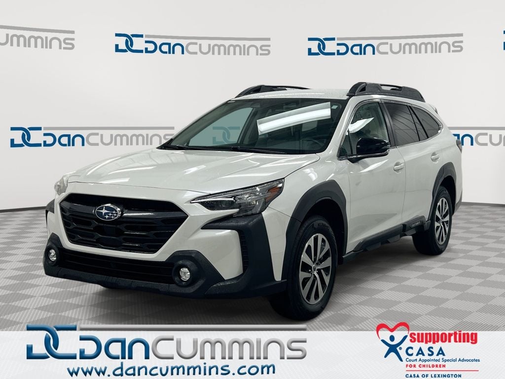 2023 Subaru Outback Premium in Crystal White Pearl — front three-quarter view
