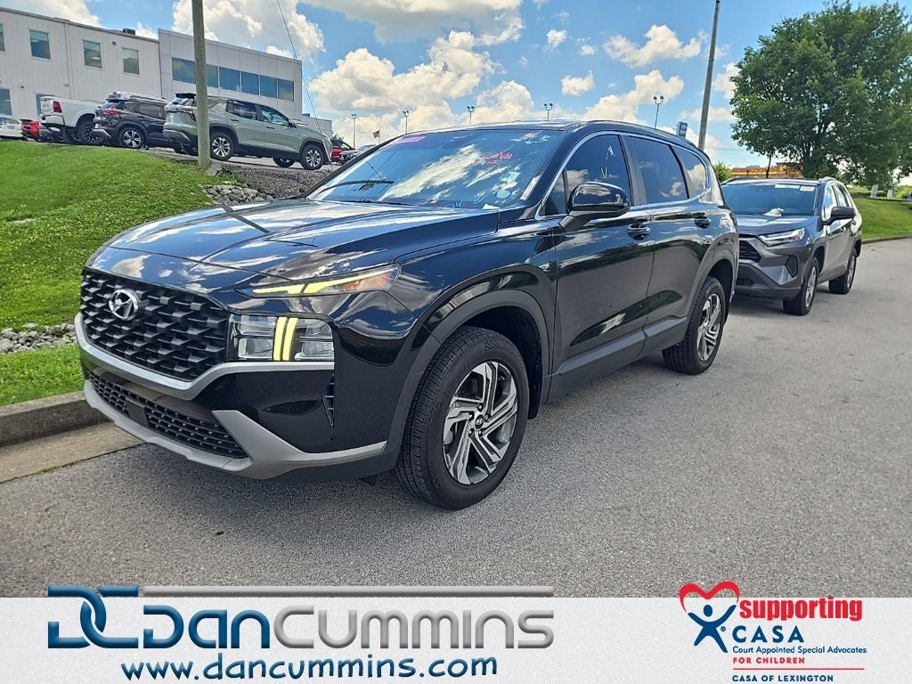 2023 Hyundai Santa Fe SE in Twilight Black — front three-quarter view