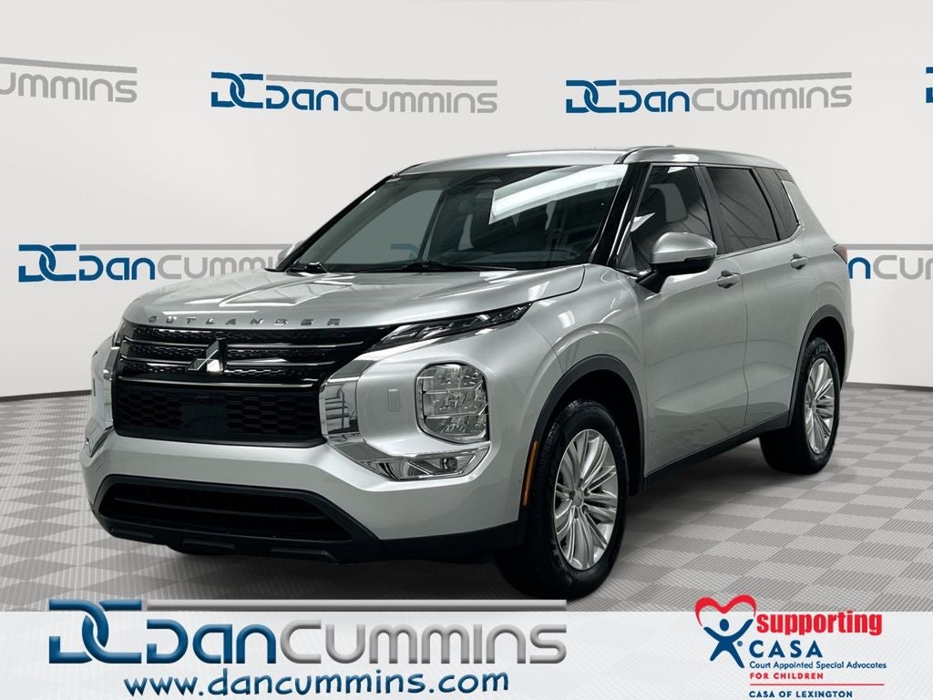 2024 Mitsubishi Outlander ES in Silver — front three-quarter view