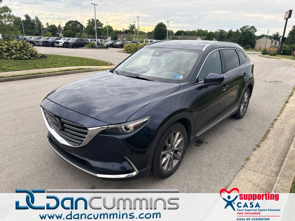 2021 Mazda Mazda CX-9 Grand Touring in Deep Crystal Blue Mica — front three-quarter view