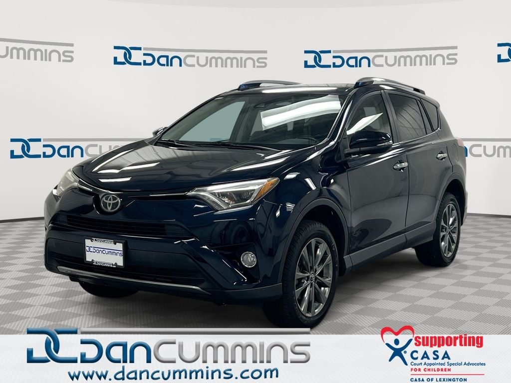2018 Toyota RAV4 Limited in Aqua — front three-quarter view