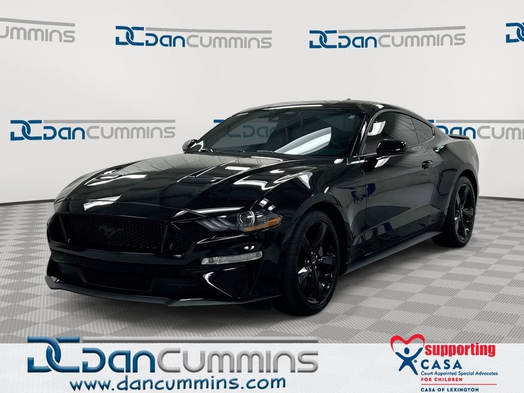 2021 Ford Mustang GT in Black — front three-quarter view