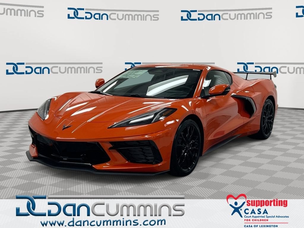 2027 Chevrolet Corvette Stingray 1LT in Sebring Orange Tintcoat — front three-quarter view