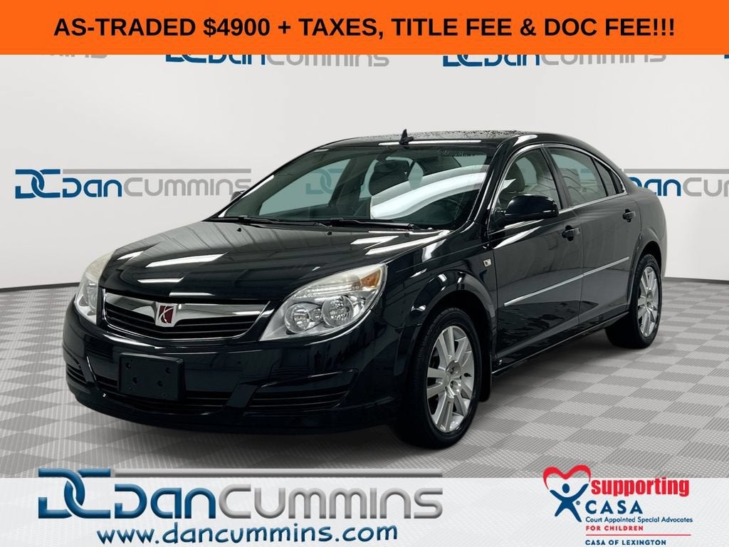 2008 Saturn Aura XE in Carbon Flash — front three-quarter view