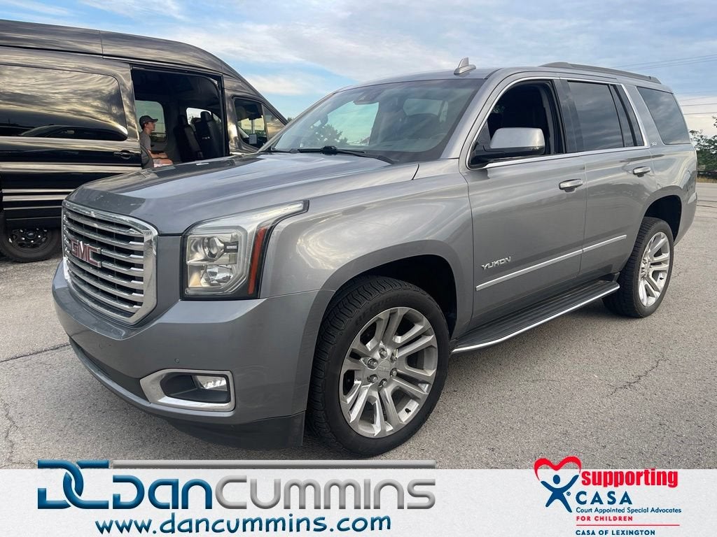 2019 GMC Yukon SLT in Satin Steel Metallic — front three-quarter view