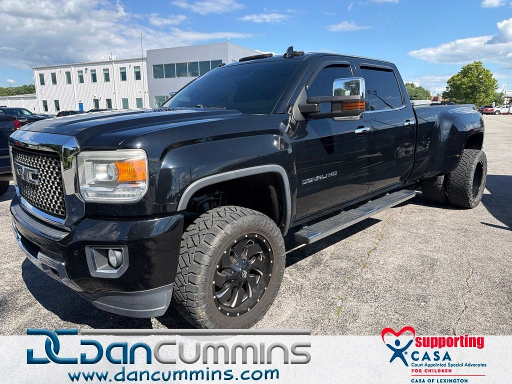2015 GMC Sierra 3500 HD Denali in Onyx Black — front three-quarter view