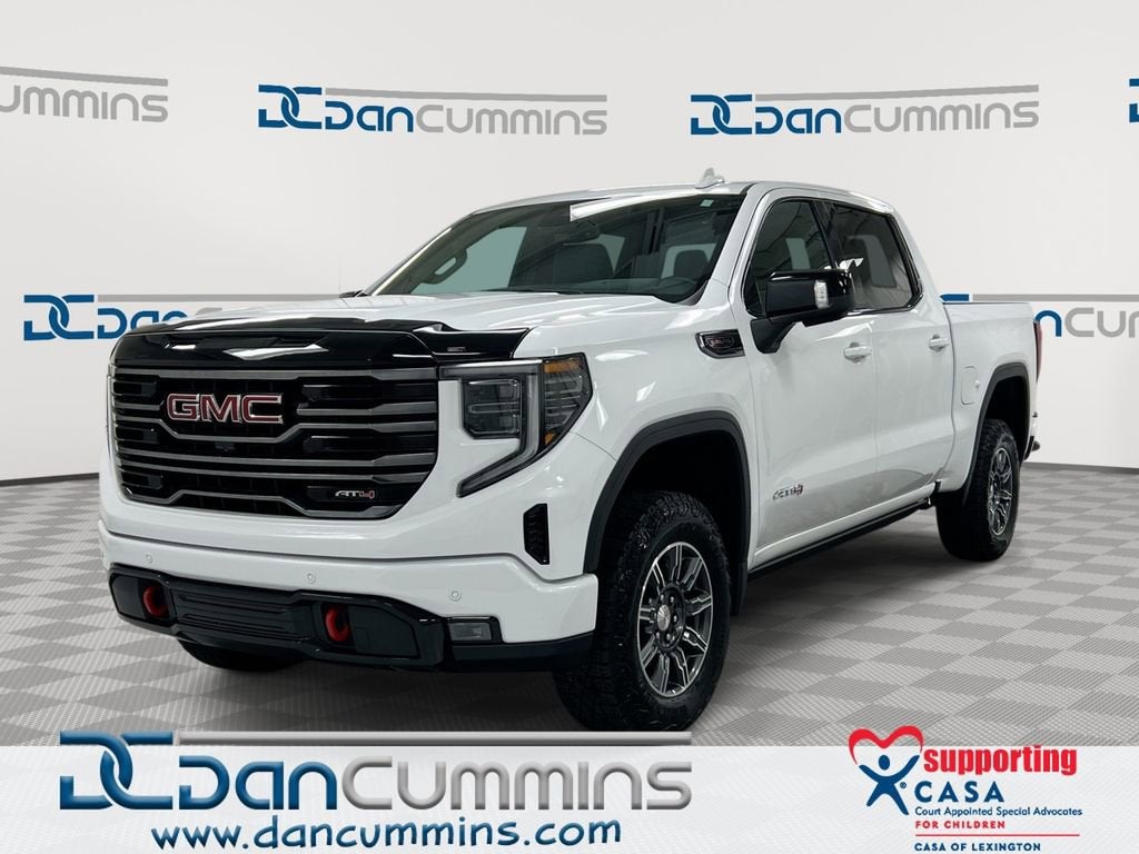 2025 GMC Sierra 1500 AT4 in Summit White — front three-quarter view