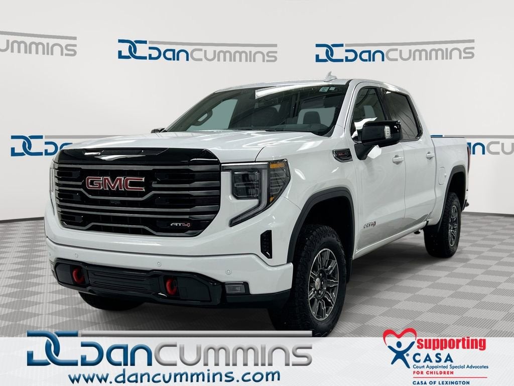 2025 GMC Sierra 1500 AT4 in Summit White — front three-quarter view