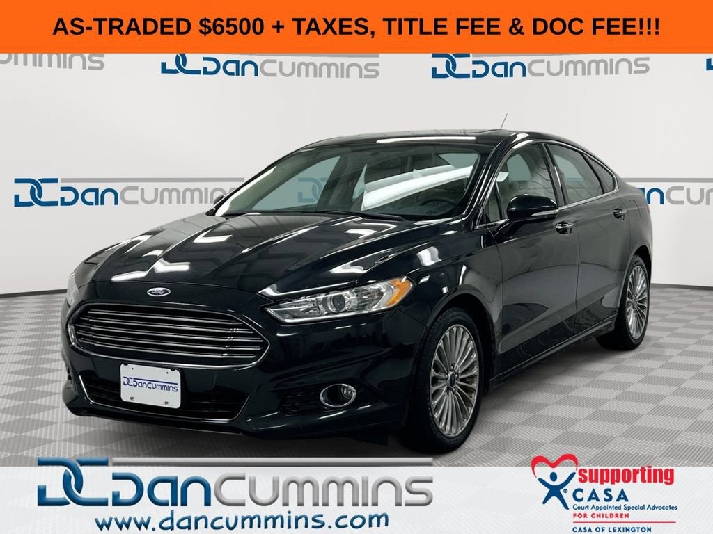 2014 Ford Fusion Titanium in Black — front three-quarter view