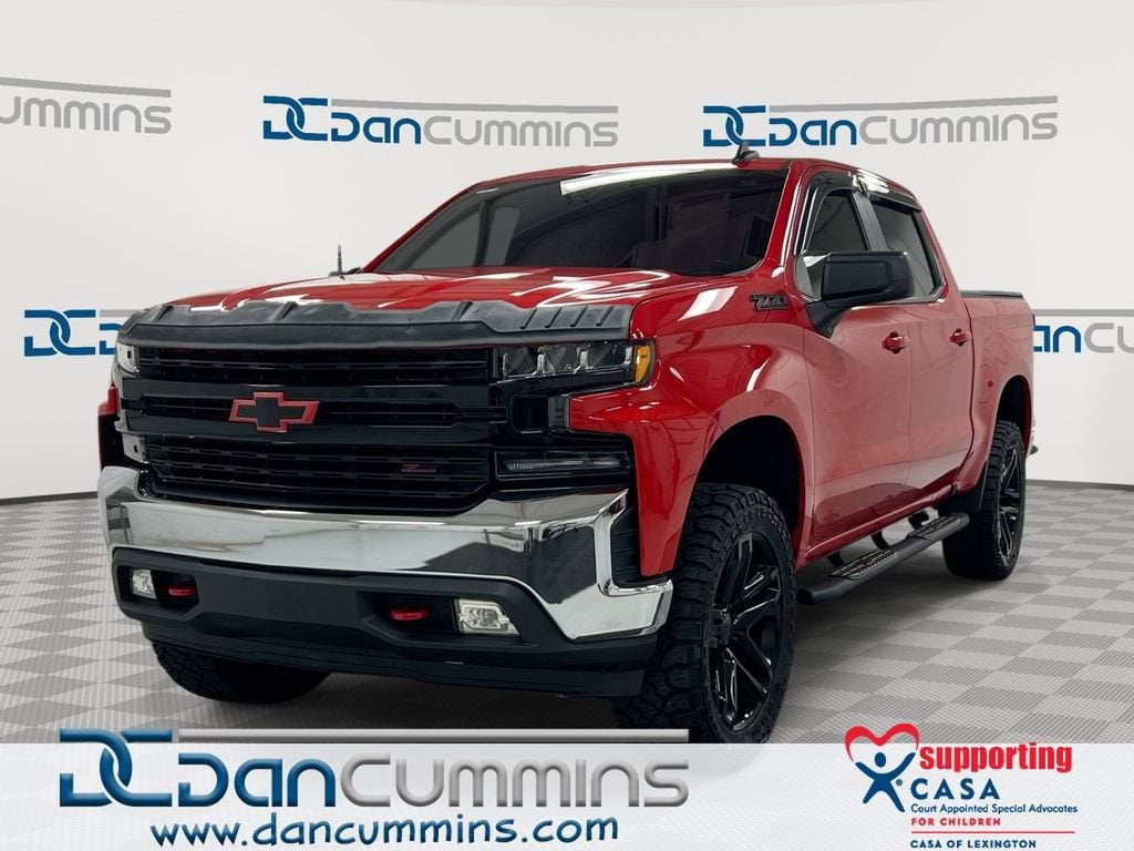 2021 Chevrolet Silverado 1500 LT in Red Hot — front three-quarter view