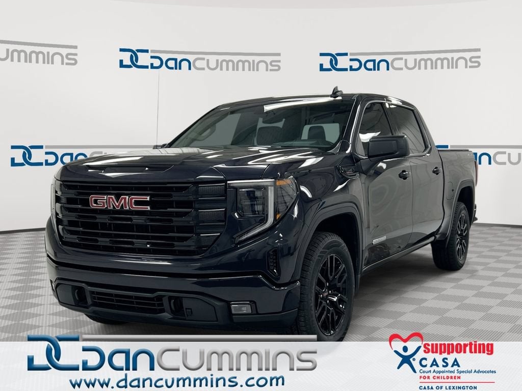 2025 GMC Sierra 1500 Elevation in Titanium Rush Metallic — front three-quarter view