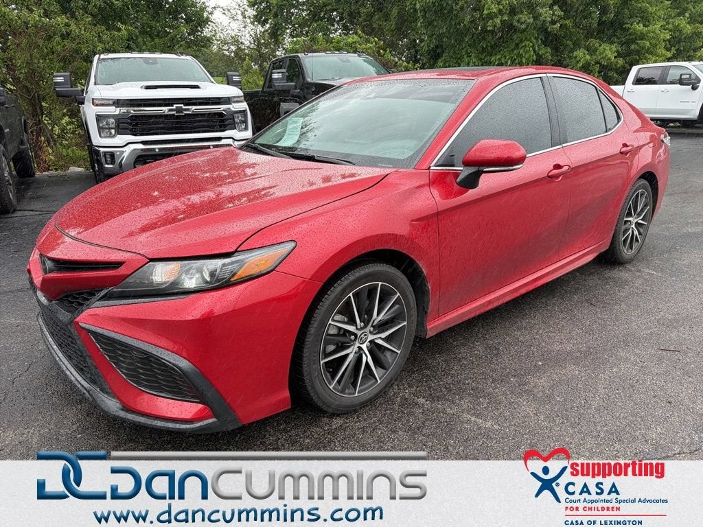 2024 Toyota Camry SE in Red — front three-quarter view