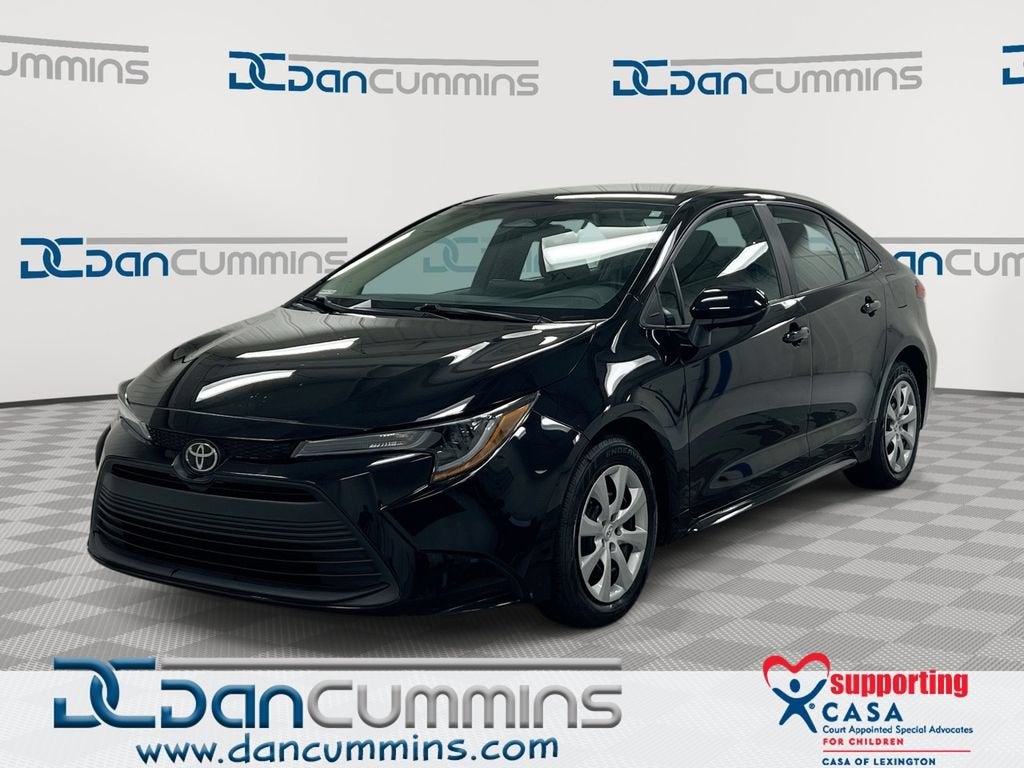 2024 Toyota Corolla LE in Black — front three-quarter view