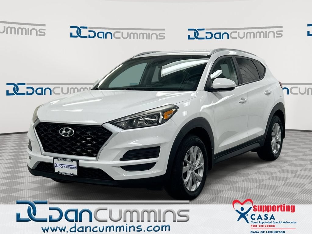 2019 Hyundai Tucson Value in White — front three-quarter view