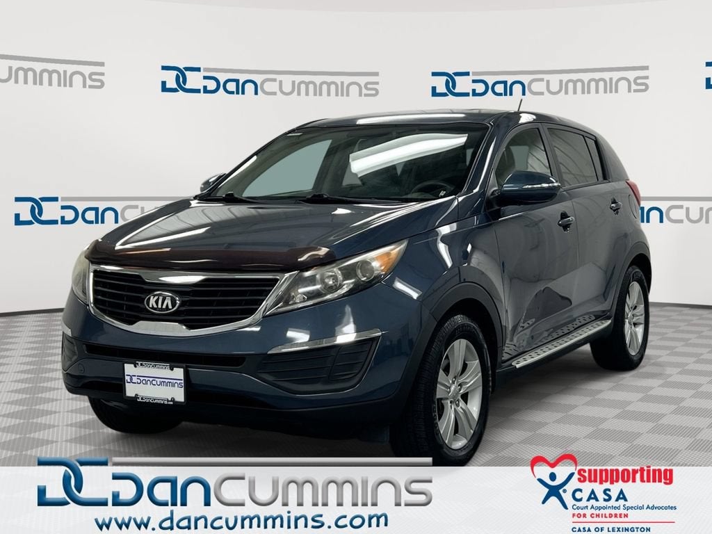 2013 Kia Sportage LX in Blue — front three-quarter view