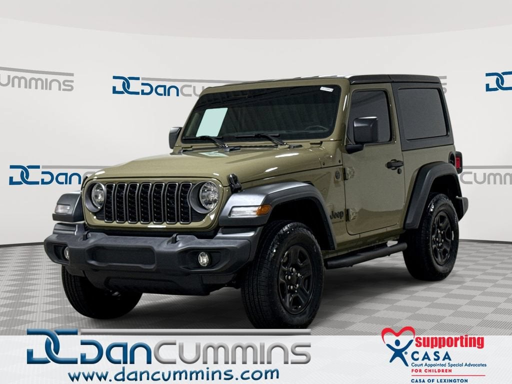 2025 Jeep Wrangler Sport in Tan — front three-quarter view
