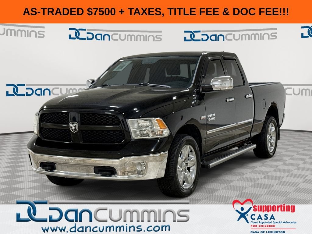 2013 RAM 1500 SLT in Black — front three-quarter view