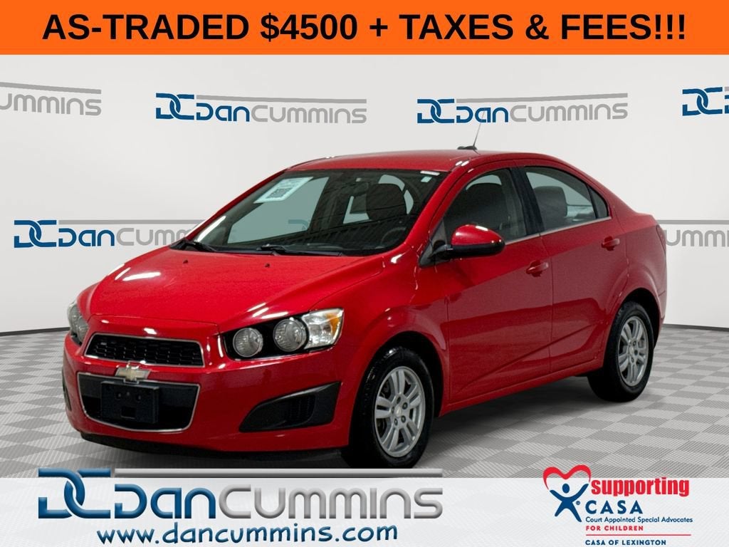 2015 Chevrolet Sonic LT in Red Hot — front three-quarter view