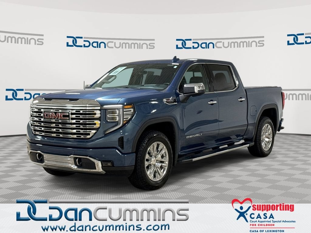 2025 GMC Sierra 1500 Denali in Downpour Metallic — front three-quarter view