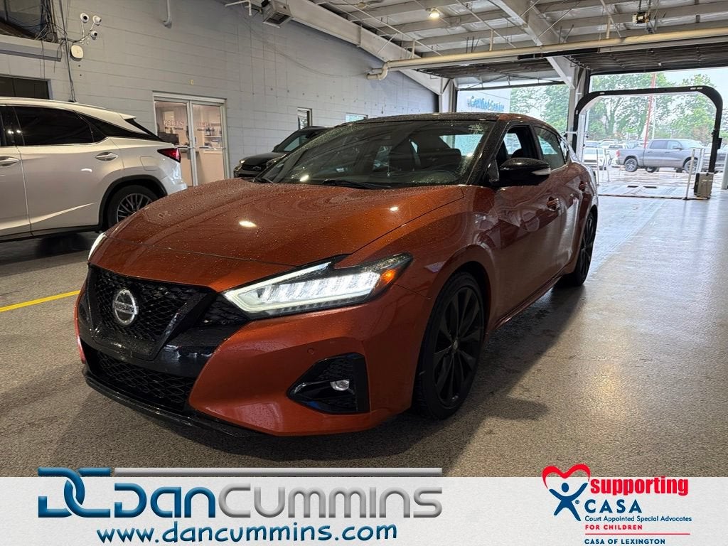 2021 Nissan Maxima SR in Orange — front three-quarter view