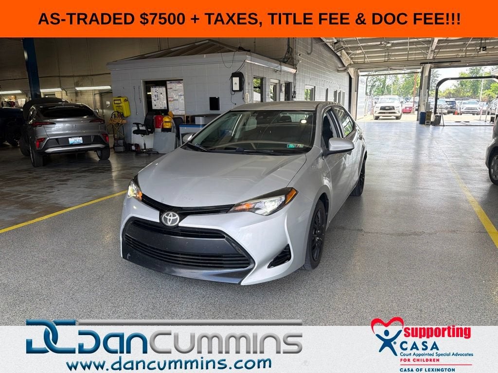 2017 Toyota Corolla L in Silver — front three-quarter view