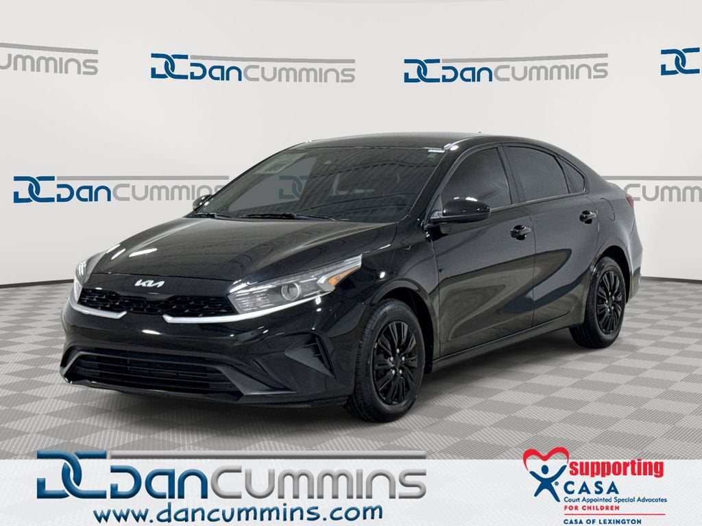 2024 Kia Forte LX in Black — front three-quarter view