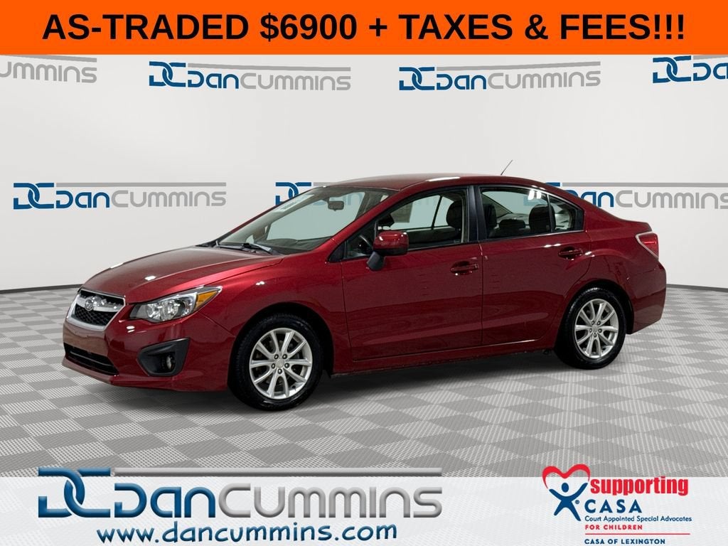 2014 Subaru Impreza Sedan Premium in Red — front three-quarter view