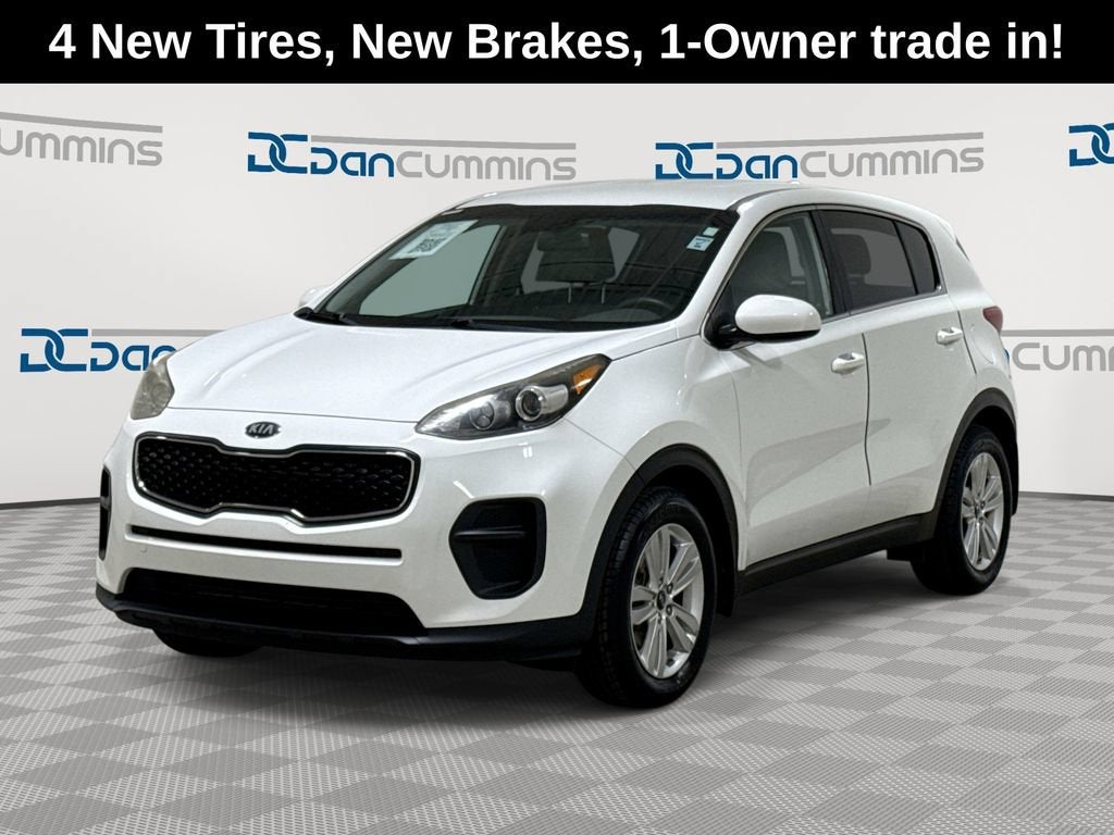 2019 Kia Sportage LX in White — front three-quarter view